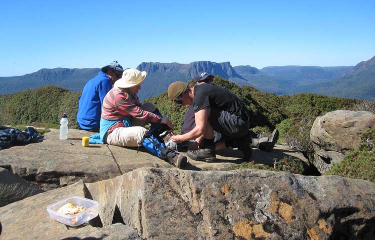 Guide John assists another walker