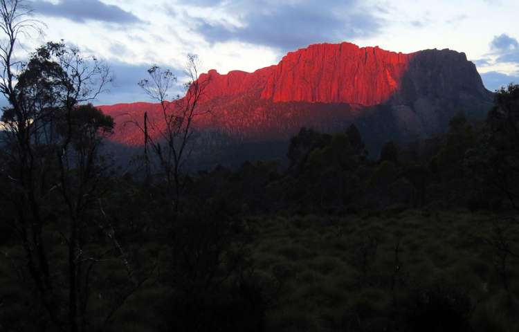 Chris WOKE me to see the red sunset on the mountain