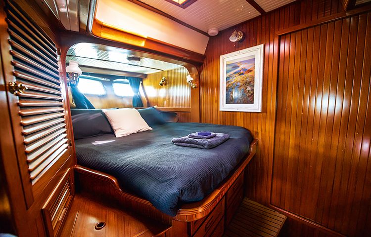 Beds inside sailboat at Wineglass Bay