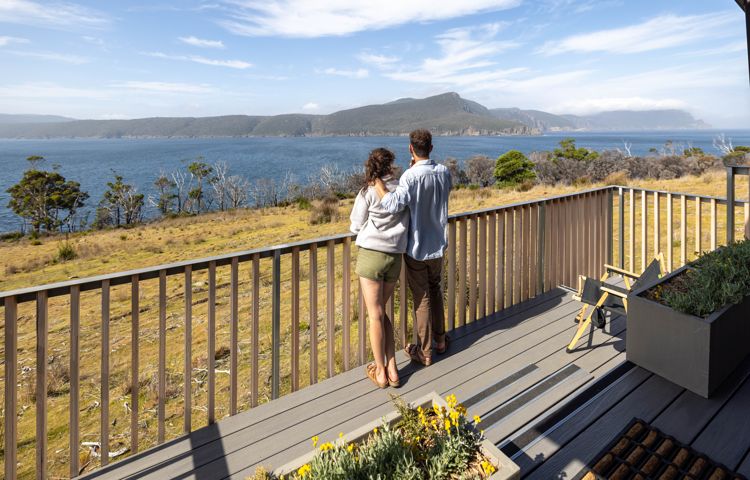 Guests standing on Balcony at Three Capes