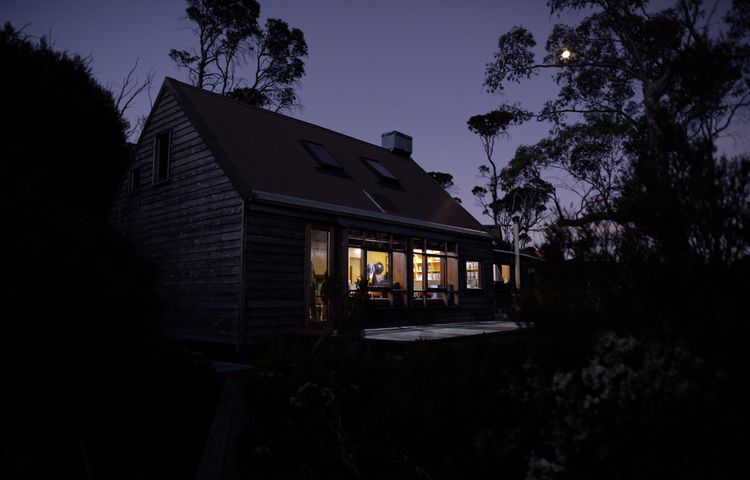 Cradle Mountain Huts Accommodation night time huts