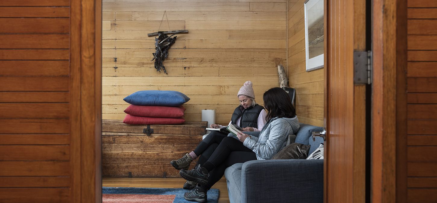 Relax in our warm accommodation after a day of bushwalking at the Bay of Fires, Tasmania
