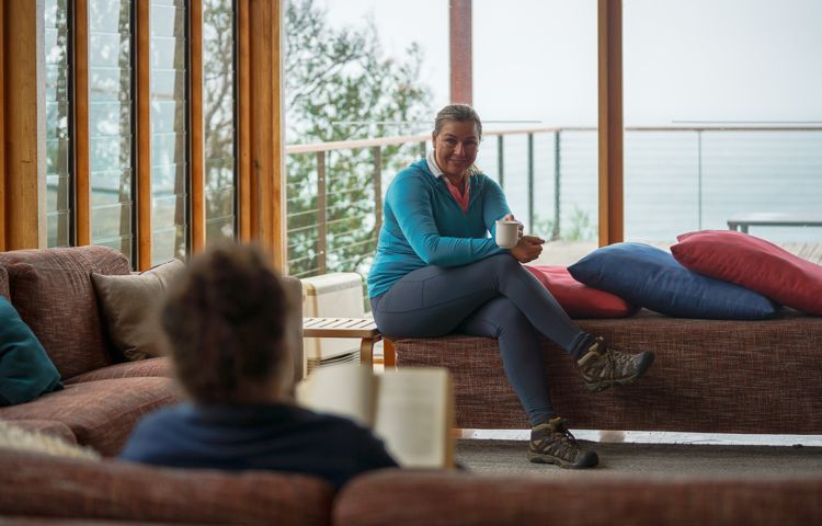 Guests sitting on couches in the Lodge