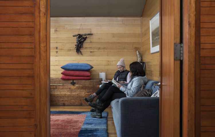 Bay of Fires Lodge, people, couch, rug