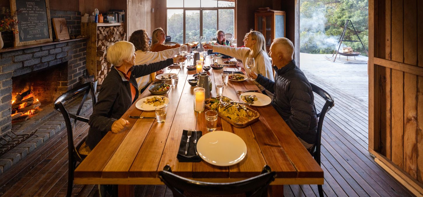 Guests at the dining table on Bruny Island Lodge Walk
