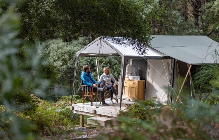 Guests talking and relaxing in Bruny Island tent