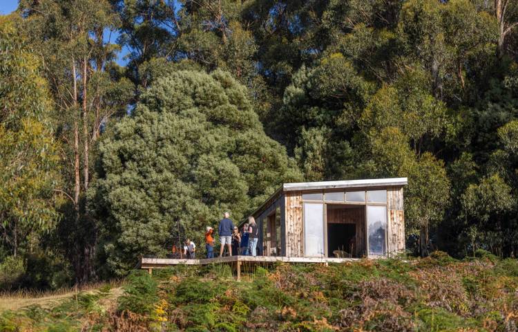 Guests standing on the deck at Bruny Island Lodge