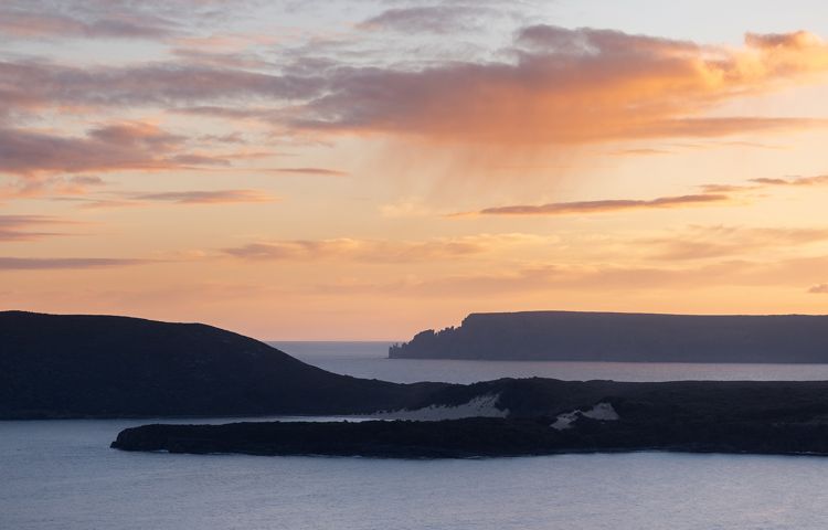 Three Capes and ocean at sunset