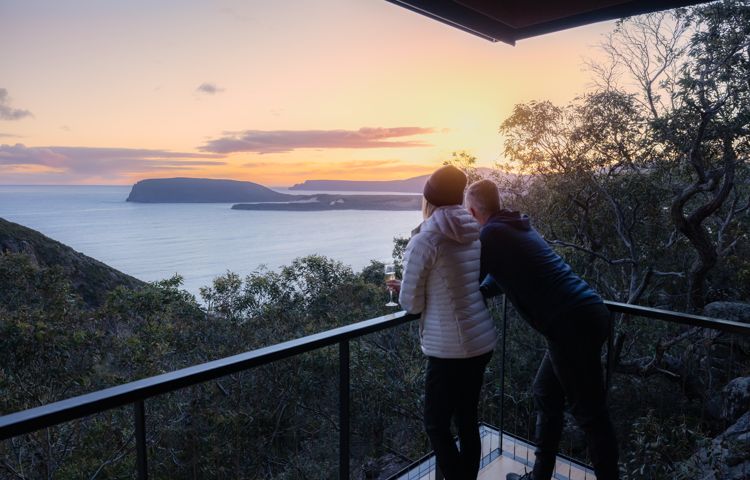 Guests watching sunset at Crescent Lodge