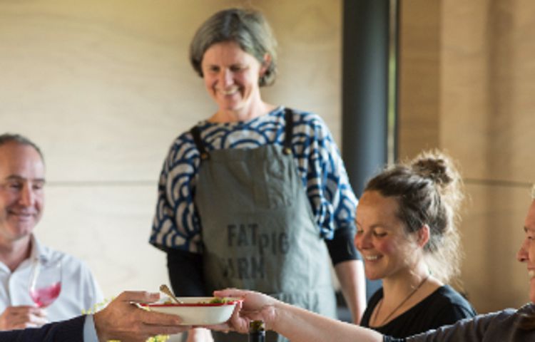 Fat Pig Farm guests enjoying a meal